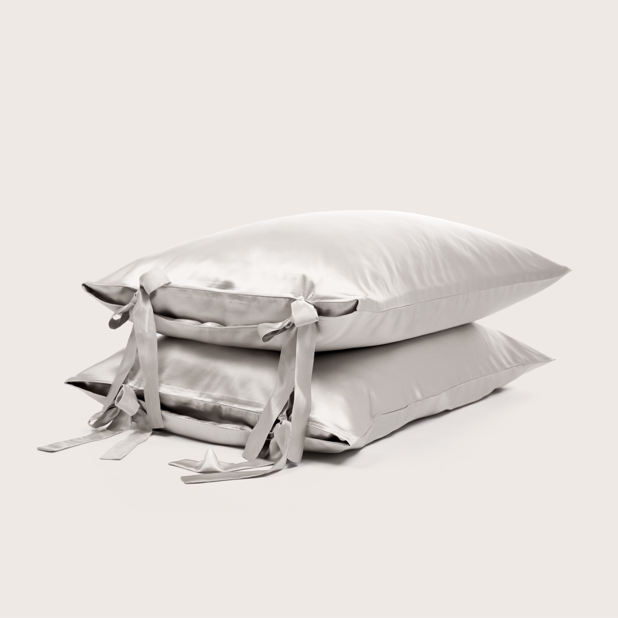 Artisan pure silk pillowcase featuring delicate traditional ribbon ties by ODAYA Home